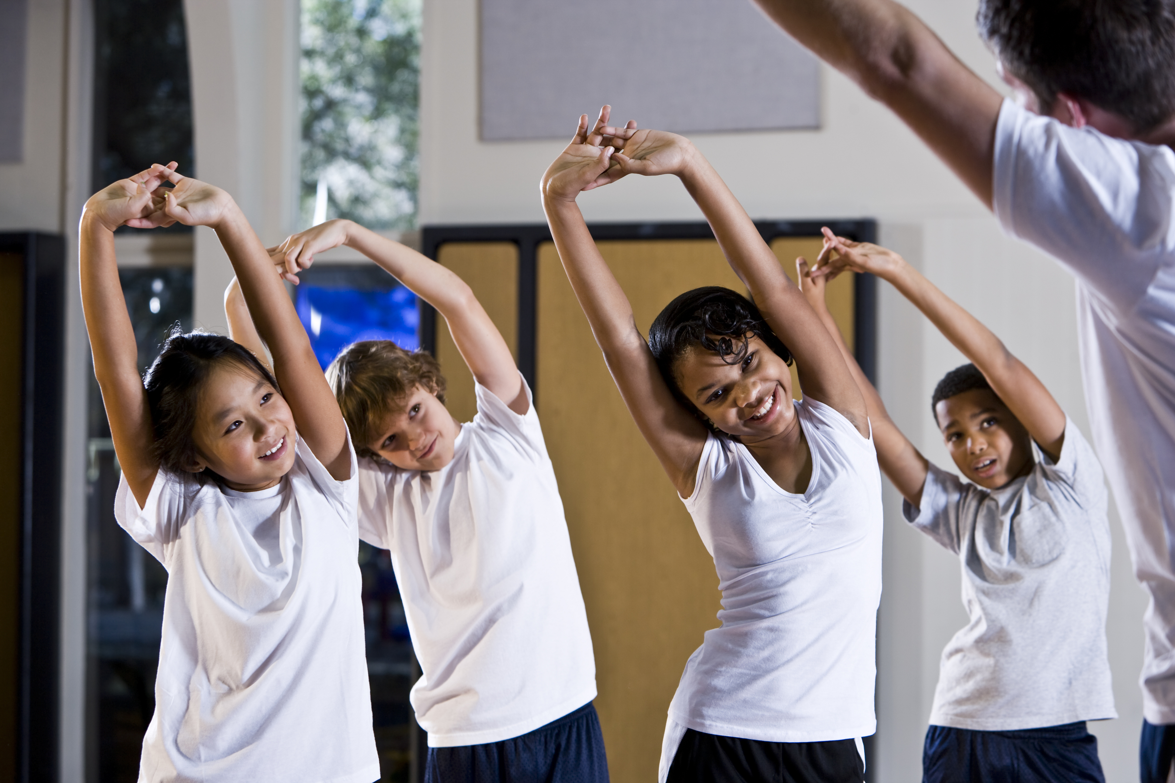 Image of young students stretching
