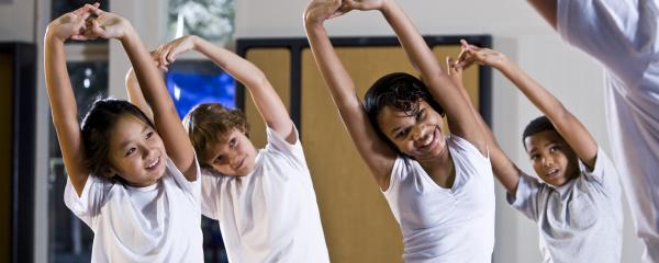 Image of young students stretching